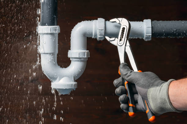Professional Emergency Plumber technician working in Whiting, IN